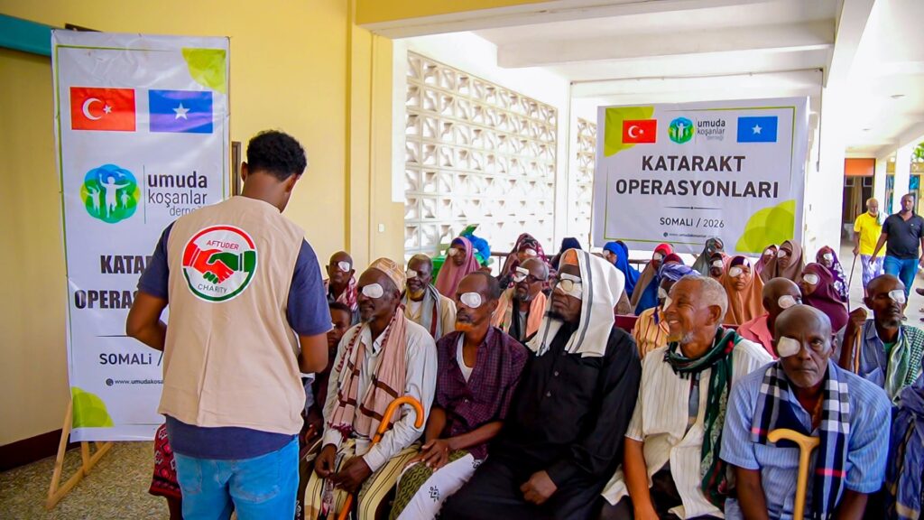 AFTUDER staff member with patients after cataract surgery in Mogadishu